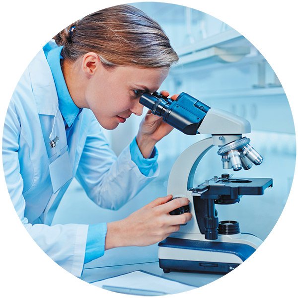 Genacol scientist with microscope